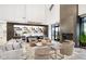 Modern lounge with fireplace, comfortable seating, and stylish beverage station at 2766 Ruffian Dr, Westfield, IN 46074