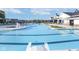 Outdoor pool with lifeguard stand, chairs, and a slide at 2766 Ruffian Dr, Westfield, IN 46074