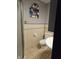 Tiled bathroom featuring modern fixtures and a shower stall at 2804 Paso Del Norte Dr, Indianapolis, IN 46227