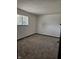 Bedroom featuring neutral carpeting and a window for natural light at 2804 Paso Del Norte Dr, Indianapolis, IN 46227