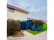 Exterior of home with fenced in back yard and two blue chairs at 2804 Paso Del Norte Dr, Indianapolis, IN 46227