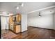 Open concept living with kitchen featuring stove and washer/dryer, plus living room with ceiling fan at 2804 Paso Del Norte Dr, Indianapolis, IN 46227