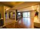 Spacious basement featuring a bar area with stools, a fireplace, and sliding glass doors to outside at 3037 Santiago Dr, Greenwood, IN 46143