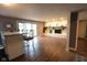 Open basement area with bar seating, an electric fireplace and sliding glass doors to outside at 3037 Santiago Dr, Greenwood, IN 46143