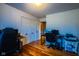 Bedroom office area featuring hardwood floors and a closet at 3037 Santiago Dr, Greenwood, IN 46143
