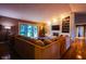 Inviting living room features a stone fireplace, built-in shelving, and sliding glass doors for natural light at 3037 Santiago Dr, Greenwood, IN 46143