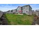 Large fenced backyard offering lush grass, a patio area, and potential for outdoor living and recreation at 315 Limerick Ln, Pendleton, IN 46064