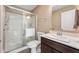 Bathroom with modern shower, updated vanity, and wood look flooring at 315 Limerick Ln, Pendleton, IN 46064