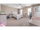 Bright bedroom with plenty of natural light, a ceiling fan, and neutral tones at 315 Limerick Ln, Pendleton, IN 46064