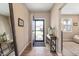 Warm and welcoming foyer with hardwood floors and natural light at 315 Limerick Ln, Pendleton, IN 46064