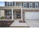 Inviting front porch with swing and a well-maintained lawn and landscaping at 315 Limerick Ln, Pendleton, IN 46064