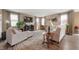 Bright living room featuring a fireplace, neutral color palette, and ample seating at 315 Limerick Ln, Pendleton, IN 46064