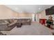 Spacious living area featuring a comfortable couch and a large television at 315 Limerick Ln, Pendleton, IN 46064