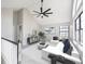 Spacious living room featuring vaulted ceilings, carpet floor, and modern decor at 3260 Eddy Ct, Indianapolis, IN 46214