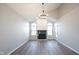 Bright, open living space features vaulted ceilings, a fireplace and modern flooring perfect for relaxing or entertaining friends at 3260 Eddy Ct, Indianapolis, IN 46214