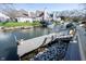 Stunning waterfront property with boat dock and lush greenery, perfect for enjoying serene lake views and boating activities at 3260 Eddy Ct, Indianapolis, IN 46214