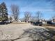 Expansive street view showcasing neighborhood homes and ample parking space available at 3844 Esquire Ct, Indianapolis, IN 46226