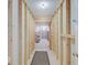 Unfinished basement space with exposed framing, offering a versatile area for customization and storage at 443 Mclaren Ln, Carmel, IN 46032