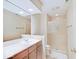 Well-lit bathroom with a vanity, large mirror, and a glass-enclosed shower for a modern touch at 443 Mclaren Ln, Carmel, IN 46032