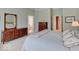 Spacious bedroom featuring furniture, carpet, and large windows at 443 Mclaren Ln, Carmel, IN 46032