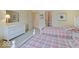 Comfortable bedroom showcasing twin beds with charming plaid bedding and ample storage space at 443 Mclaren Ln, Carmel, IN 46032