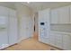 Bright kitchen with white cabinetry, modern appliances, and ample storage space at 443 Mclaren Ln, Carmel, IN 46032