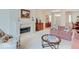 Cozy living room featuring a fireplace, comfortable sofa, and bright natural light at 443 Mclaren Ln, Carmel, IN 46032
