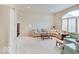 Cozy living room with ample natural light, comfortable seating and a built in cabinet at 443 Mclaren Ln, Carmel, IN 46032