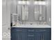 Bathroom featuring double sinks and modern fixtures at 46 N Denny St, Indianapolis, IN 46201