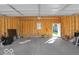 A view of the inside of the home's unfinished garage space, still in construction at 46 N Denny St, Indianapolis, IN 46201