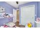 This bedroom features lots of natural light, fresh paint, and closet space at 516 Hanover Dr, Anderson, IN 46012