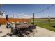 Relaxing patio area with comfortable seating, dining, and scenic views at 5387 Crowley Pkwy, Whitestown, IN 46075