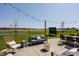 Outdoor patio with ample seating, a grill, fire pit, and scenic views for relaxing or entertaining at 5387 Crowley Pkwy, Whitestown, IN 46075