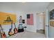 Bedroom with carpet, guitars, and flags at 5541 Fair Ridge Pl, Indianapolis, IN 46221