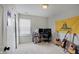 Bedroom with guitars, gaming setup, and carpet flooring at 5541 Fair Ridge Pl, Indianapolis, IN 46221