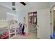 Bedroom with a lofted bed and open closet at 5541 Fair Ridge Pl, Indianapolis, IN 46221