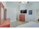 Spacious main bedroom features modern flooring, neutral walls, ceiling fan, and a full bath at 5541 Fair Ridge Pl, Indianapolis, IN 46221