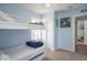 Light blue bedroom featuring bunk beds and a window at 555 Leeds Ave, Indianapolis, IN 46203
