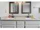 Modern bathroom with double sink vanity, granite countertops, and sleek fixtures creating a luxurious feel at 5710 Dapple Trce, Indianapolis, IN 46228