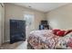 Cozy bedroom with neutral walls, carpet, and a window that fills the room with natural sunlight at 5710 Dapple Trce, Indianapolis, IN 46228