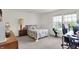 Comfortable bedroom with a bright sunny window, a double bed and carpeted floors at 5861 W Deerview Bnd, McCordsville, IN 46055