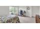 Bright bedroom with a large window, desk and chair. Perfect for a student or home office at 5861 W Deerview Bnd, McCordsville, IN 46055