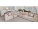 Comfortable living room with large sectional sofa. Features neutral decor and plenty of space at 5861 W Deerview Bnd, McCordsville, IN 46055