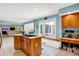 Spacious kitchen with a wood island, tile countertops, and recessed lighting at 5861 W Deerview Bnd, McCordsville, IN 46055
