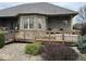 Backyard deck featuring a hot tub, perfect for relaxing and entertaining at 6089 W Hellis Dr, Muncie, IN 47304