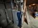 Image of home's utilities in the basement, including a furnace and water heater at 6089 W Hellis Dr, Muncie, IN 47304