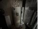 Image shows the water heater and utilities in the basement of the home at 6089 W Hellis Dr, Muncie, IN 47304