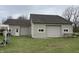 Two-car detached garage provides ample space for vehicles and storage with functional design and practical features at 6089 W Hellis Dr, Muncie, IN 47304