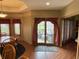 Light-filled dining room featuring access to the outdoor patio at 6089 W Hellis Dr, Muncie, IN 47304