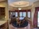 Charming dining room with hardwood floors and natural light at 6089 W Hellis Dr, Muncie, IN 47304